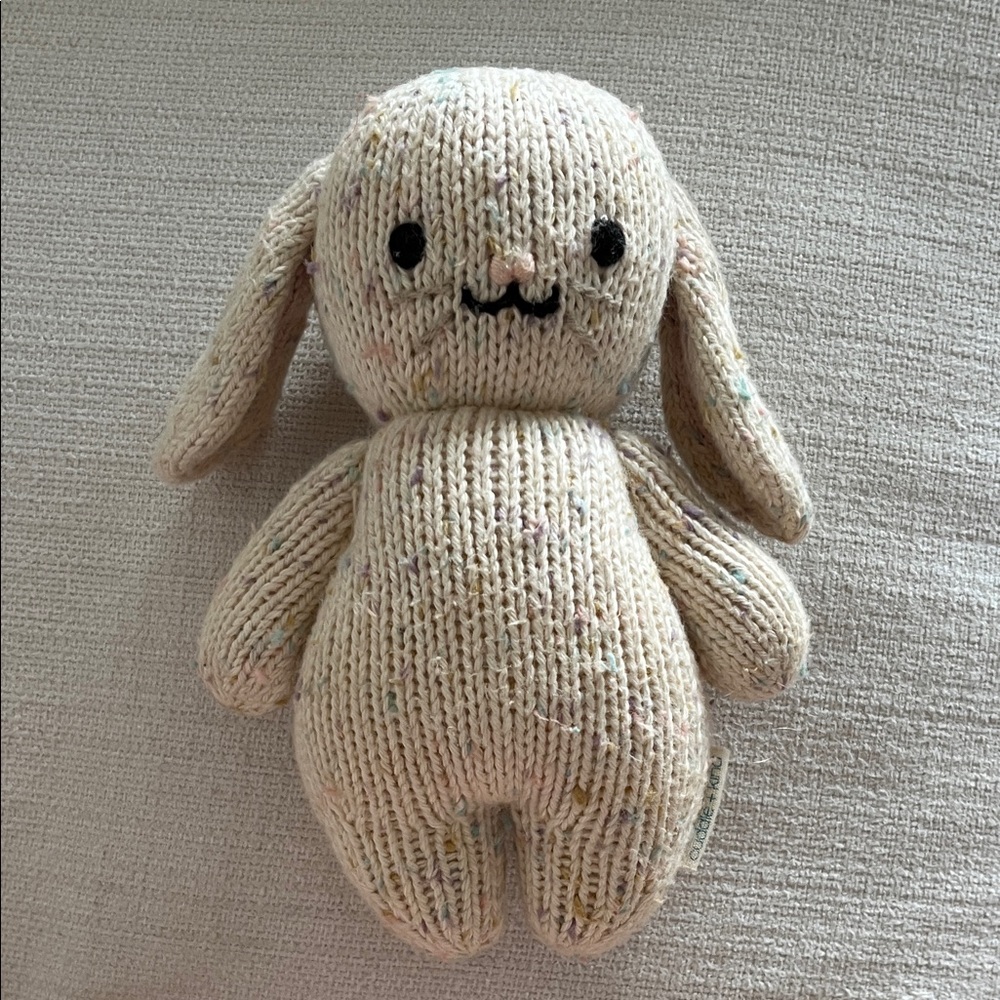 Cuddle + Kind baby bunny plush, specifically the Confetti color